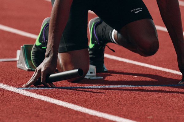 What specific stretching routines can prevent hamstring injuries in UK sprinters?